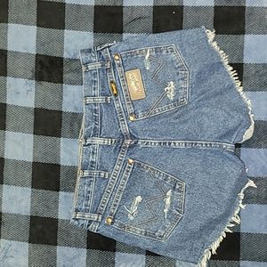 Vintage. Wrangler. Jean Shorts. Artistically created.  Waist 31 inseem 13